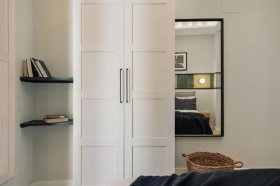 a bedroom with a bed with a tray on it at Asmali - 2 bedrooms and terrace in Sant Pere in Barcelona