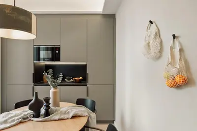 a living room with a couch and a table at Asmali - 2 bedrooms and terrace in Sant Pere in Barcelona
