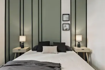 a desk with a chair and a table with a lamp at Pegaso - 2 bedrooms and terrace in Sant Gervasi in Barcelona