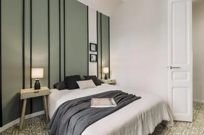 a living room with a couch and a table at Pegaso - 2 bedrooms and terrace in Sant Gervasi in Barcelona
