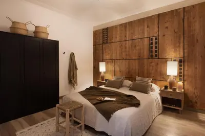 a kitchen with black and white cabinets and a sink at Afrera - 2 bedrooms and terrace in Sant Gervasi in Barcelona
