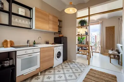 a kitchen with a sink and a dishwasher at Takari - 1 bedroom and balcony in Gràcia in Barcelona