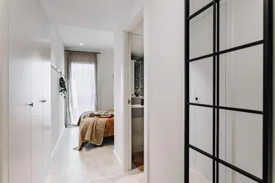 a bedroom with a bed and a window at Viella - 3 bedrooms in Eixample Esquerra in Barcelona