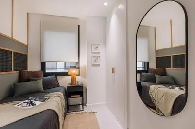 a kitchen and living room with a table and a dining room at Sare - 3 bedrooms in Eixample Esquerra in Barcelona