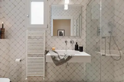 a bedroom with a bed with a tray of food on it at Karakoy - 2 bedrooms and balcony in Eixample Dreta in Barcelona
