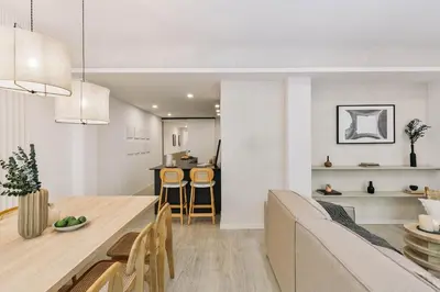 a kitchen with a counter with a bowl of fruit on it at Palinuro - 3 bedrooms in Sant Antoni in Barcelona