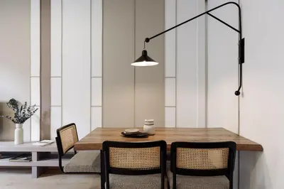 a white kitchen with white cabinets and a sink at Costa - 3 bedrooms, balcony in Eixample Esquerra in Barcelona