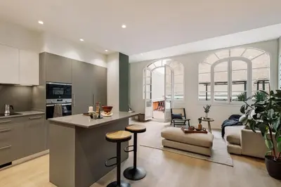 a living room with a couch and a table at Peten - 3 bedrooms, terrace and balcony in Gràcia in Barcelona