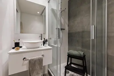 a bedroom with a large bed and a window at Peten - 3 bedrooms, terrace and balcony in Gràcia in Barcelona