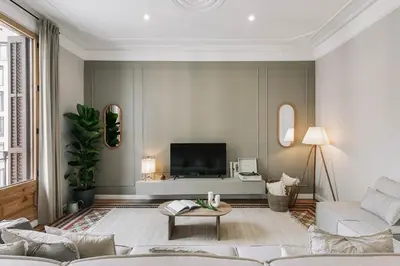 a bedroom with a bed with a book on it at Velino - 4 bedrooms and office in Sant Antoni in Barcelona