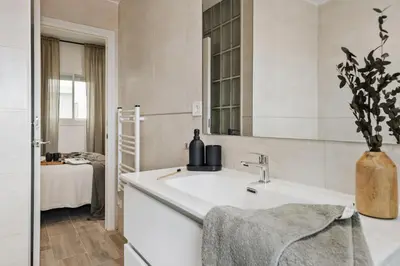 a bedroom with a bed with a tray on it at Guacimal - 1 bedroom and terrace in Sants in Barcelona
