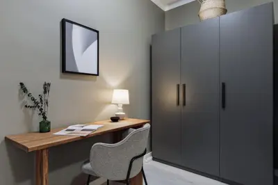 a bedroom with a large bed with two lamps at Noguera - 2 bedrooms in Eixample Esquerra in Barcelona