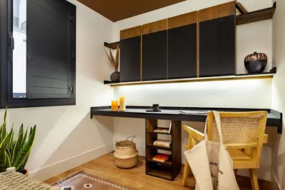 a bedroom with a large bed with two pillows at Annamer - 2 bedrooms and terrace in El Born in Barcelona