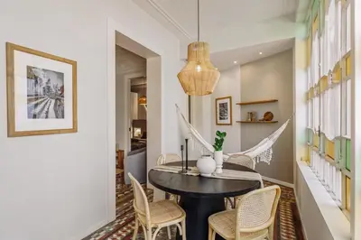 a desk with a chair and a lamp on it at Toliman - 1 bedroom and office in Eixample Dreta in Barcelona