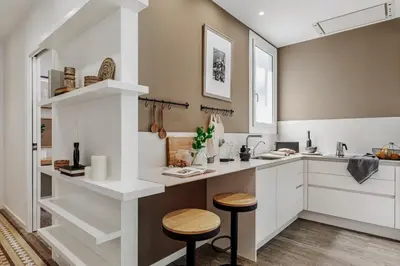 a hallway with a mirror and a rug at Toliman - 1 bedroom and office in Eixample Dreta in Barcelona