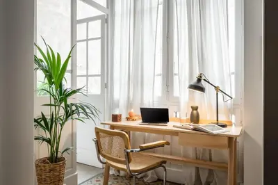 a white bathroom with a toilet and a sink at Gili - 2 bedrooms and terrace in Eixample Dreta in Barcelona