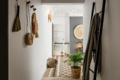 an office with a desk with a laptop and a chair at Gili - 2 bedrooms and terrace in Eixample Dreta in Barcelona