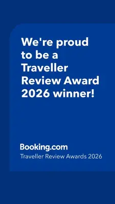 a blue sign that says were proud to be a traveller reviewagency winner at Cal Ticó, 6 guests Monistrol de Montserrat in Monistrol