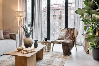 a bathroom with a toilet and a sink and a mirror at Vacar - 3 bedrooms in Eixample Esquerra in Barcelona