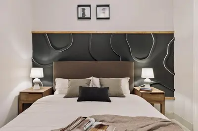 a living room with a couch and a tv at Judd - 3 bedrooms and balcony in Eixample Esquerra in Barcelona