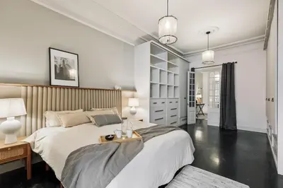 a living room with a couch and a table at Valls - 2 bedrooms and office in Gràcia in Barcelona