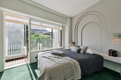 a dining room with a table and chairs at Delfino - 4 bedrooms in Sant Gervasi in Barcelona
