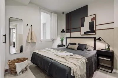 a living room with a couch and a table at Andy - 2 bedrooms and office and balcony in Eixample Dreta in Barcelona