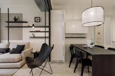 a living room with a white couch and a table at Warhol - 2 bedrooms and balcony in Sant Gervasy in Barcelona