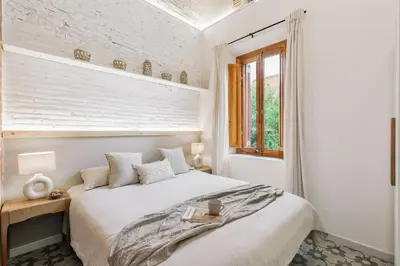 a patio with two couches and a table at Maiori - 2 bedrooms and terrace in Sant Gervasi in Barcelona