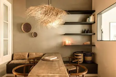a living room with a wooden table and chairs at Tambo - 2 bedrooms in Eixample Esquerra in Barcelona