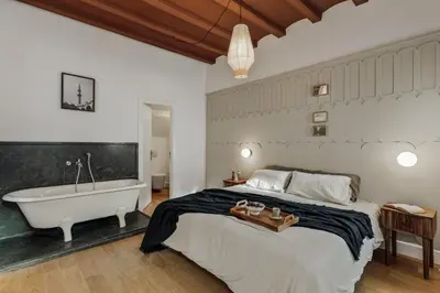 a living room with a couch and a table at Damat - 4 bedrooms and terrace in Sarrià in Barcelona