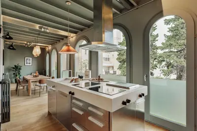 a bathroom with a large tub and a window at Damat - 4 bedrooms and terrace in Sarrià in Barcelona