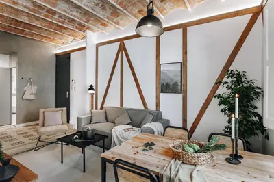 a bedroom with a large bed with a large headboard at Ossau - 3 bedrooms in Sant Gervasi in Barcelona