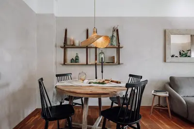 a living room with a couch and a table at Cazalla - 2 bedrooms and office in Gràcia in Barcelona