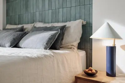 a bedroom with a large bed and a window at Banchina - 1 bedroom and terrace in Sant Gervasi in Barcelona