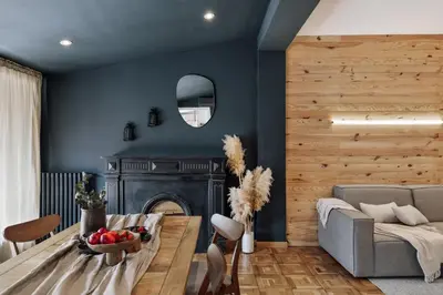a bedroom with a large bed and a bath tub at Quemu - 2 bedrooms in Eixample Esquerra in Barcelona