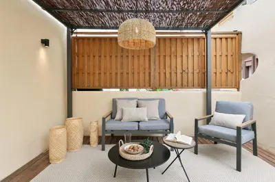 a bedroom with a bed and a large mirror at Nerano - 2 bedrooms and terrace in Gràcia in Barcelona