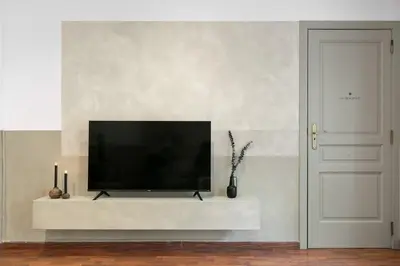 a living room with a couch and a table at Nerano - 2 bedrooms and terrace in Gràcia in Barcelona