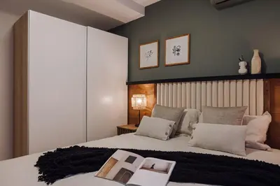 a bedroom with a large bed with two pillows at Nava - 3 bedrooms in Sant Gervasi in Barcelona