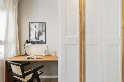 a bathroom with a mirror and a wooden table at Conca - 2 bedrooms apartment in Sant Gervasi in Barcelona