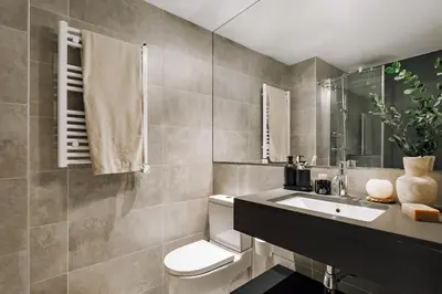 a living room with a couch and a table at Cadiar - 2 bedrooms in Eixample Esquerra in Barcelona