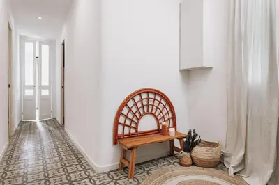 a bedroom with a bed and a window at Seron - 3 bedrooms and office in Eixample Esquerra in Barcelona