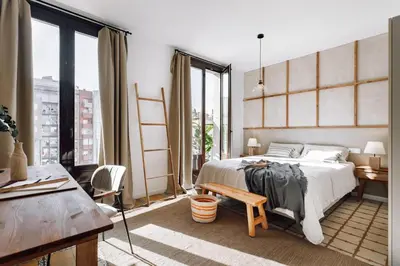 a dining room with a table and four chairs at Seron - 3 bedrooms and office in Eixample Esquerra in Barcelona