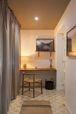a bedroom with a large bed with white sheets at Amandi - 2 bedrooms in Gràcia in Barcelona