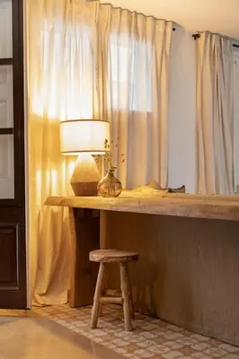 a bedroom with a bed and a lamp and a window at Amandi - 2 bedrooms in Gràcia in Barcelona
