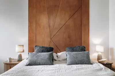 a bedroom with a bed and a mirror and a desk at Biescas - 1 bedroom in Eixample Esquerra in Barcelona