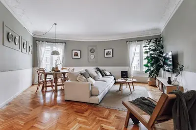 a kitchen with white cabinets and a sink at Olvera - 3 bedrooms in Eixample Dreta in Barcelona