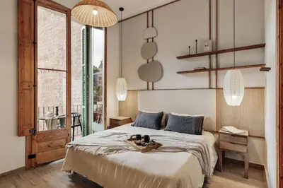 a living room with a couch and a table at Kaax - 3 bedrooms and balcony in Eixample in Barcelona