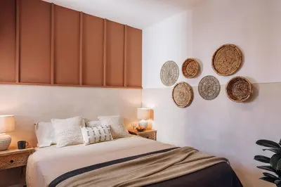 a bedroom with a bed and an open door at Lugros - 3 bedrooms in Gràcia in Barcelona