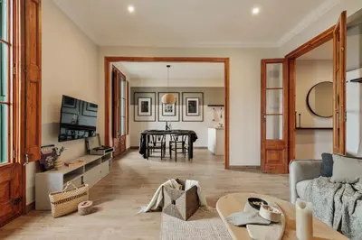 a kitchen with white cabinets and a sink at Potosi - 3 bedrooms and balcony in Eixample Dreta in Barcelona